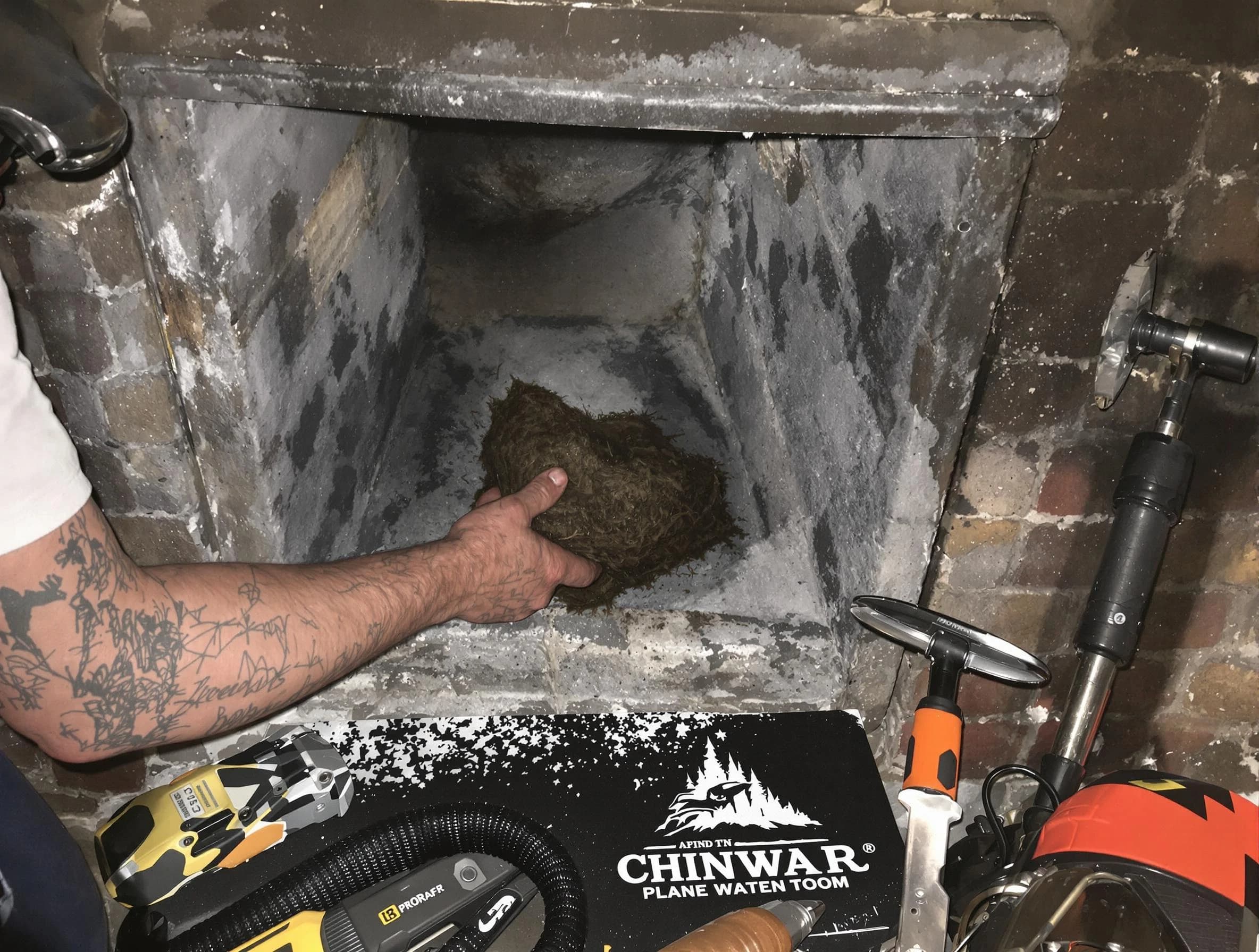 Newcastle Chimney Sweep safely removing debris and screening chimney in Newcastle, OK